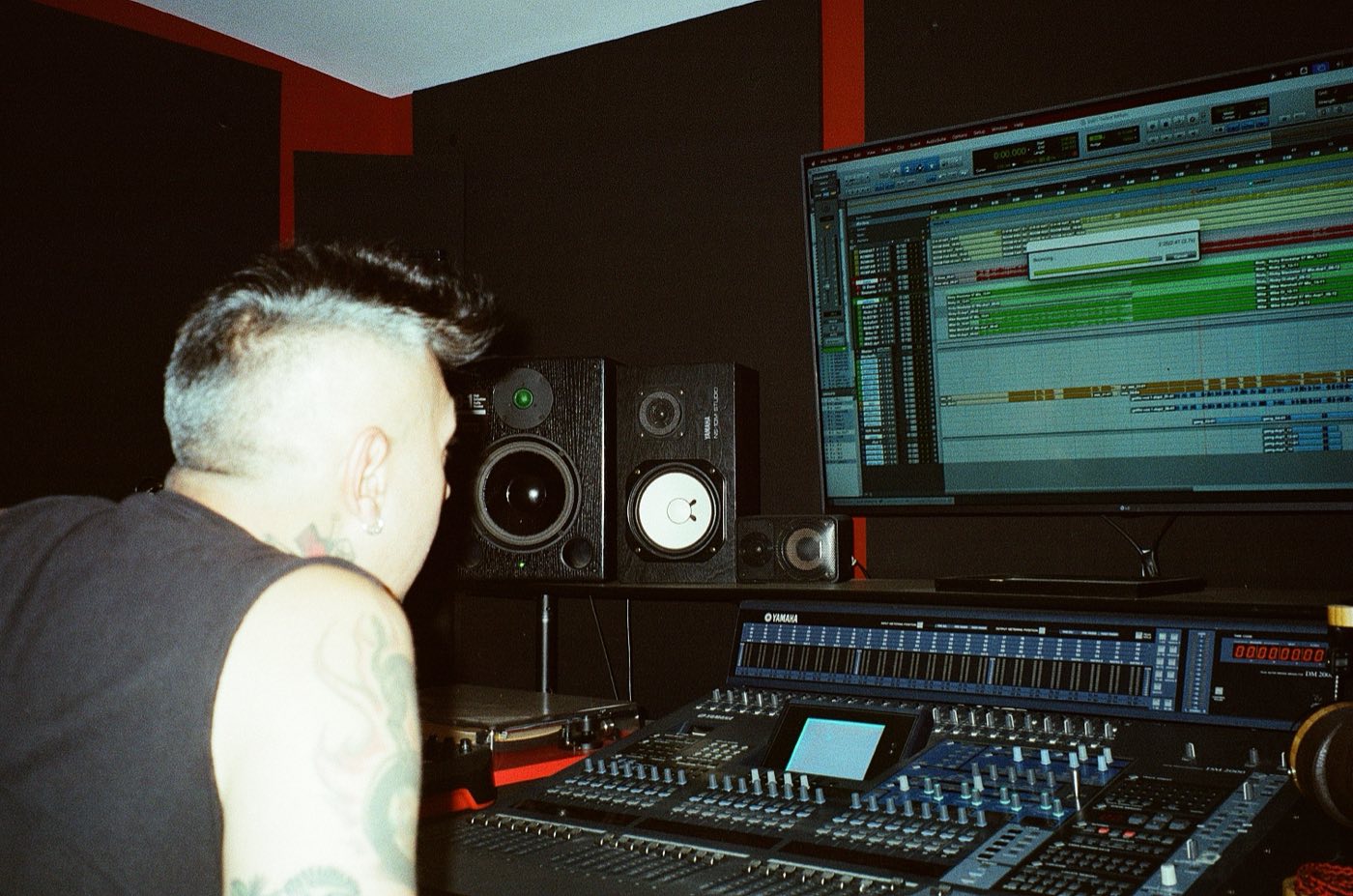 Over René's shoulder at the console, a session open on the screen